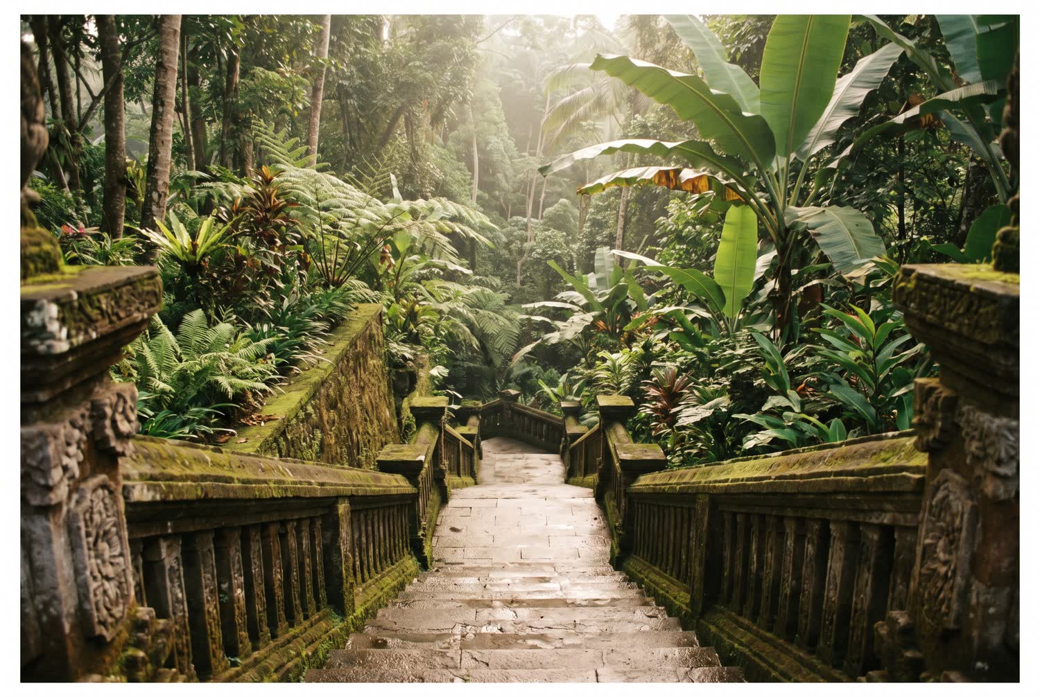 An inland Ubud garden with dense green planting against carved stone and weathered timber, reached by a stone stair.
